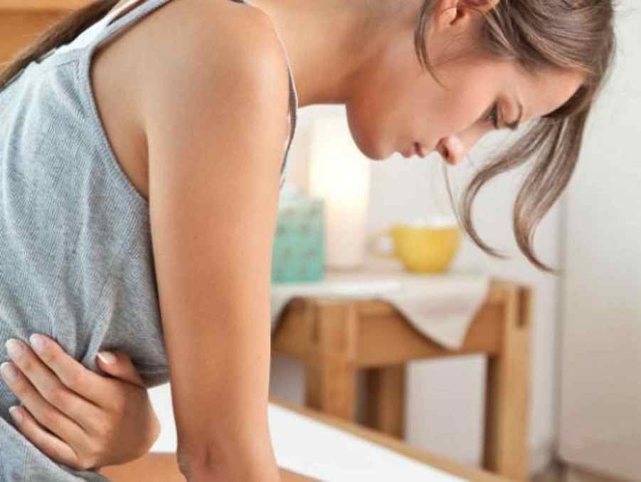 Почему болит и тянет низ живота перед месячными?